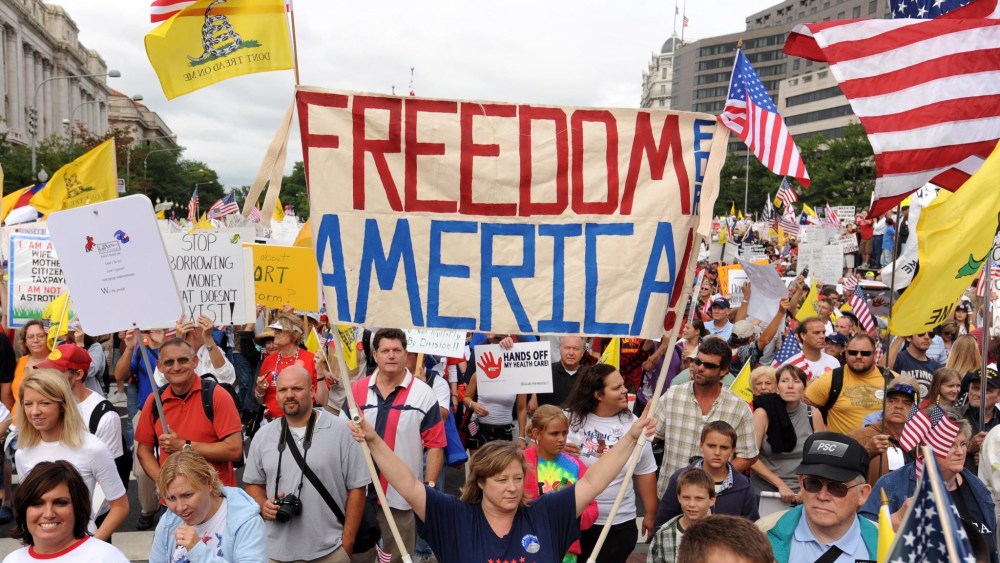 Image: Thousands of people join a march and demonstration to protest health care reform proposed by US President Barack Obama
