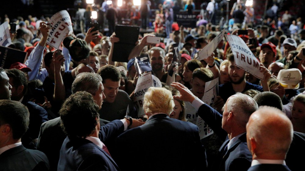 Image: U.S. Republican presidential candidate Donald Trump greets audience members at a campaign rally in Bangor