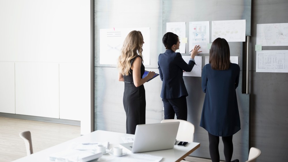 Image: Businesswomen brainstorming in conference room