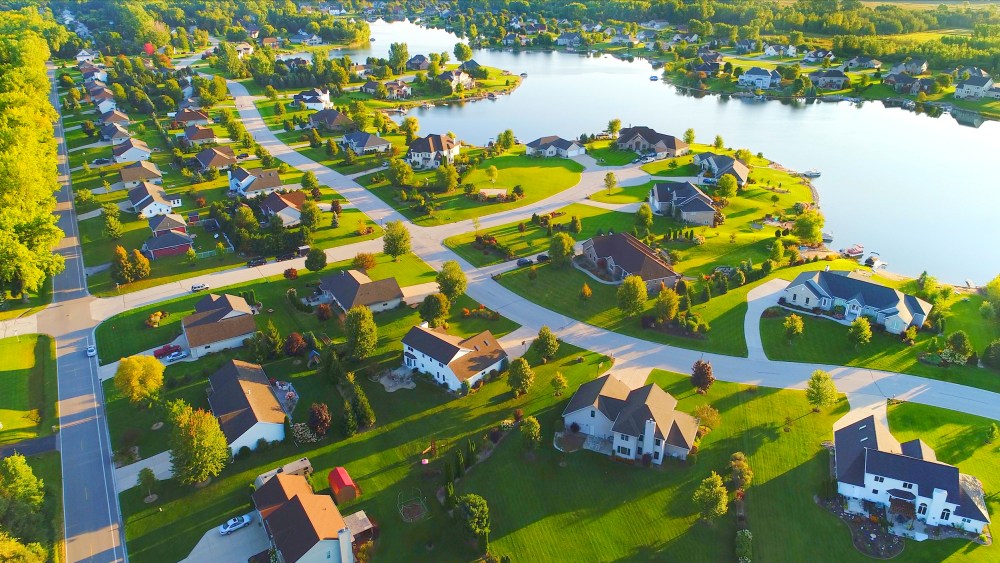 Idyllic neighborhood on lakefront at dawn.