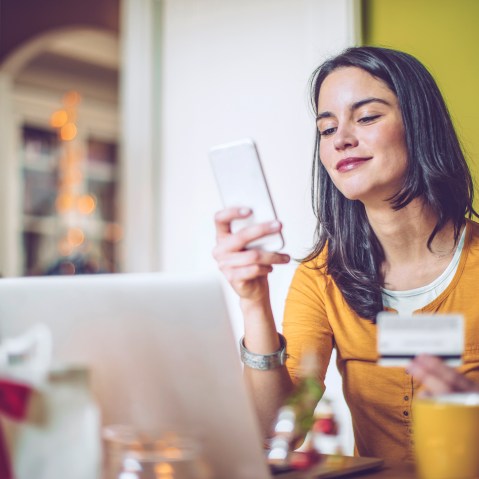 Image: Young Woman Shops At Home