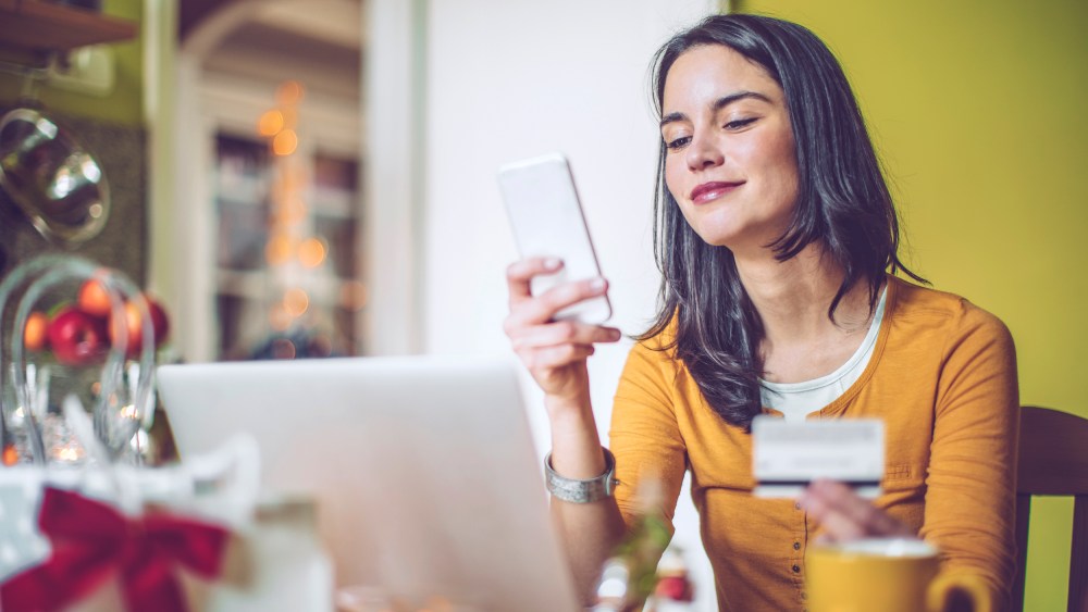 Image: Young Woman Shops At Home