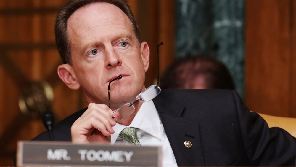 Image: Republican Sen. Pat Toomey of Pennsylvania listens to testimony