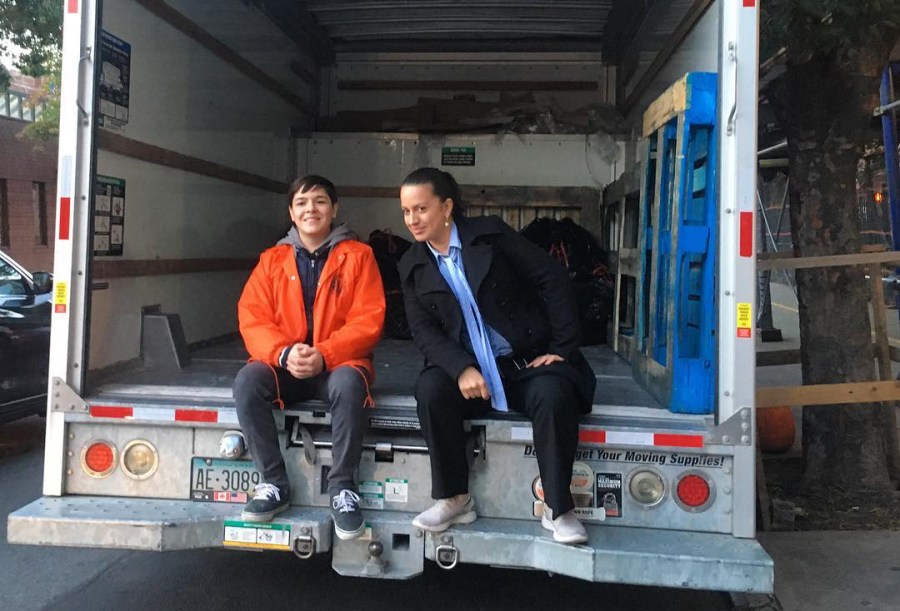 Catalina Cruz helps pack candy for the Halloween parade in Jackson Heights, Queens.