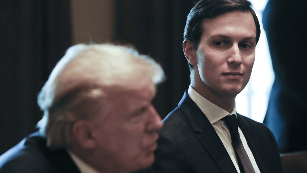Image: White House Senior Adviser and envoy, Jared Kushner, listens as President Donald Trump speaks during a meeting in the Cabinet Room of the White House