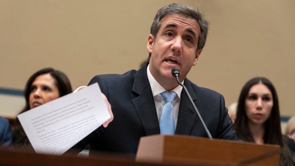 Image: Michael Cohen, former lawyer for President Donald Trump, reads his opening statement during testimony on Capitol Hill on Feb. 27, 2019.