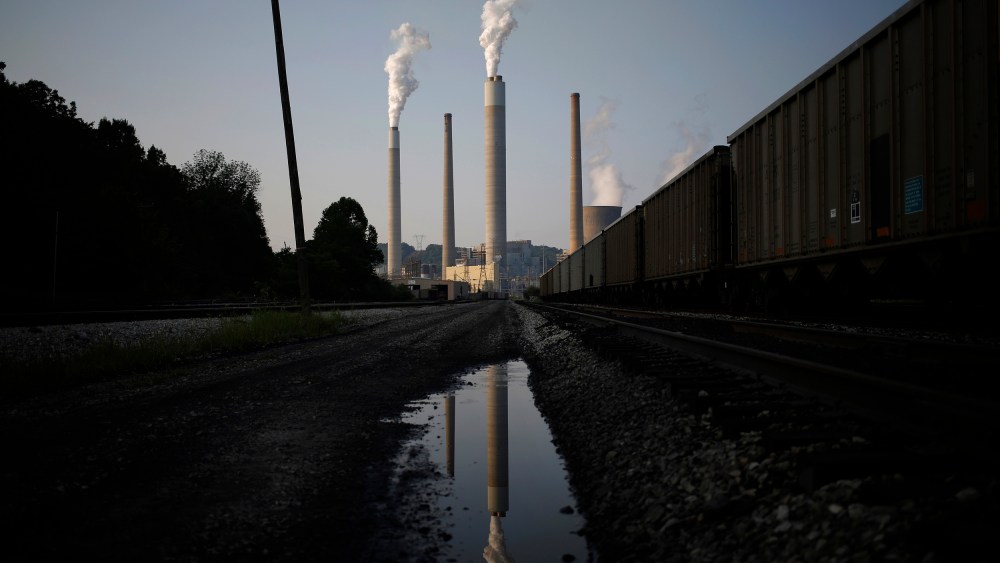 Image: Emissions rise from the American Electric Power Co. Inc. coal power plant in Winfield, West Virginia, on July 31, 2014.