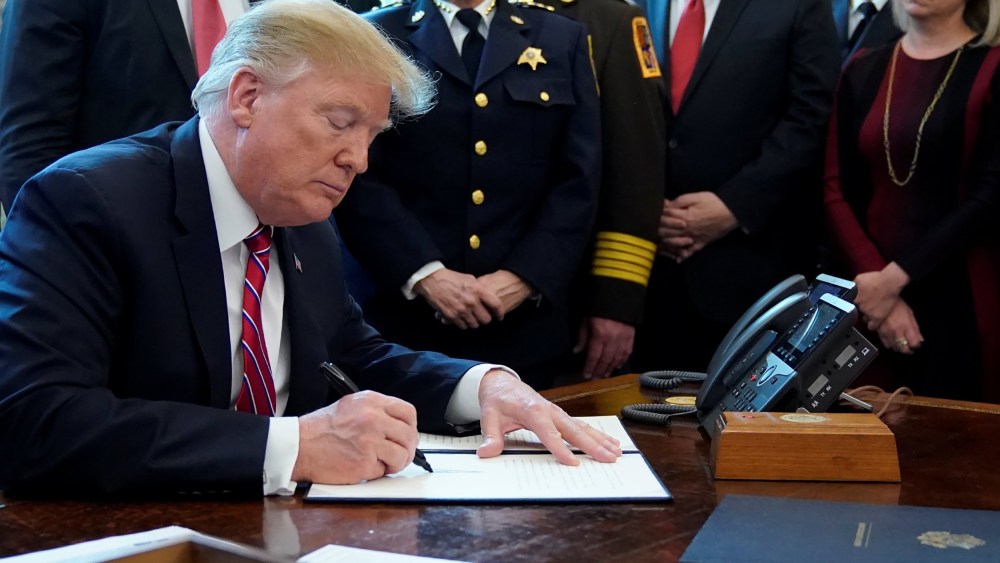 Image: President Donald Trump signs veto of congressional resolution to end emergency declaration at the White House in Washington