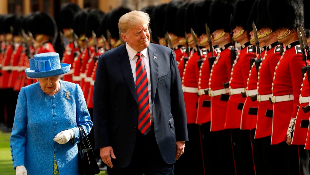 Image: Queen Elizabeth and President Donald Trump inspect the guard of honor at Windsor Castle in England on July 13, 2018.