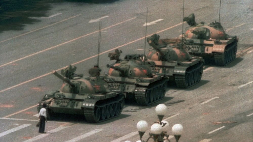 Image: A Chinese man stands alone to block a line of tanks heading east on Beijing's Cangan Blvd. in Tiananmen Square on June 5, 1989.
