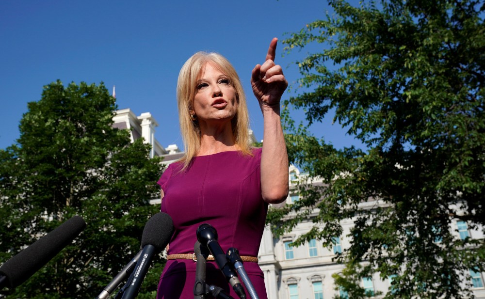 Image: Kellyanne Conway speaks to reporters at the White House in Washington
