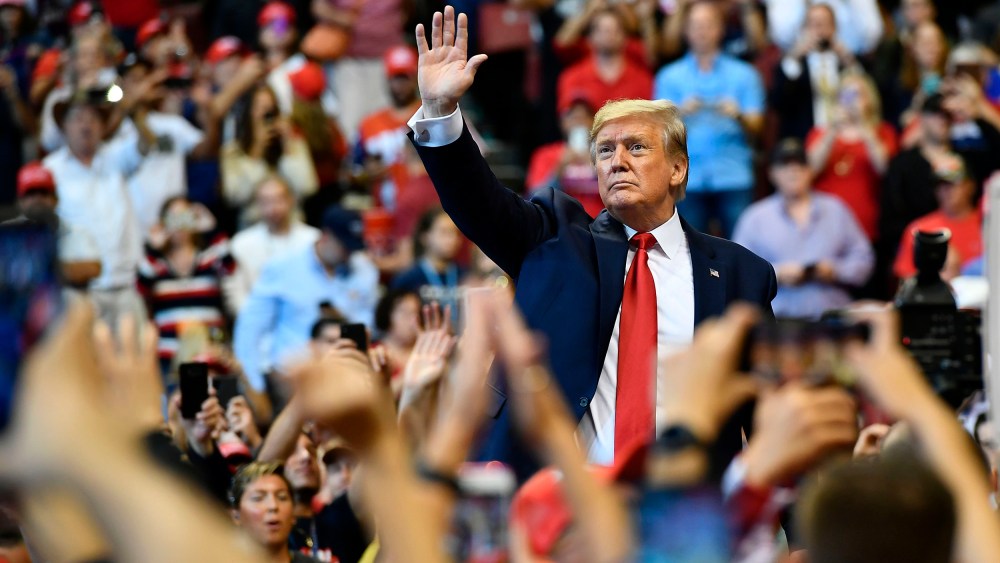 Image: President Donald Trump waves to supporters during a "Keep America Great" campaign rally in Sunrise