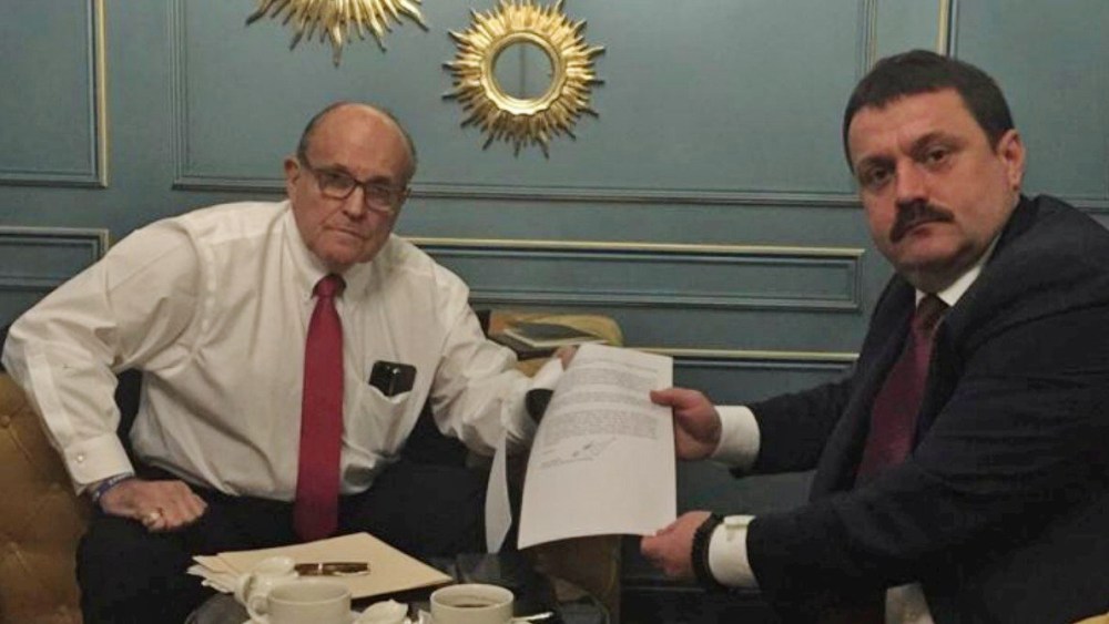 Image: Ukrainian lawmaker Derkach attends a meeting with U.S. lawyer Giuliani in Kiev