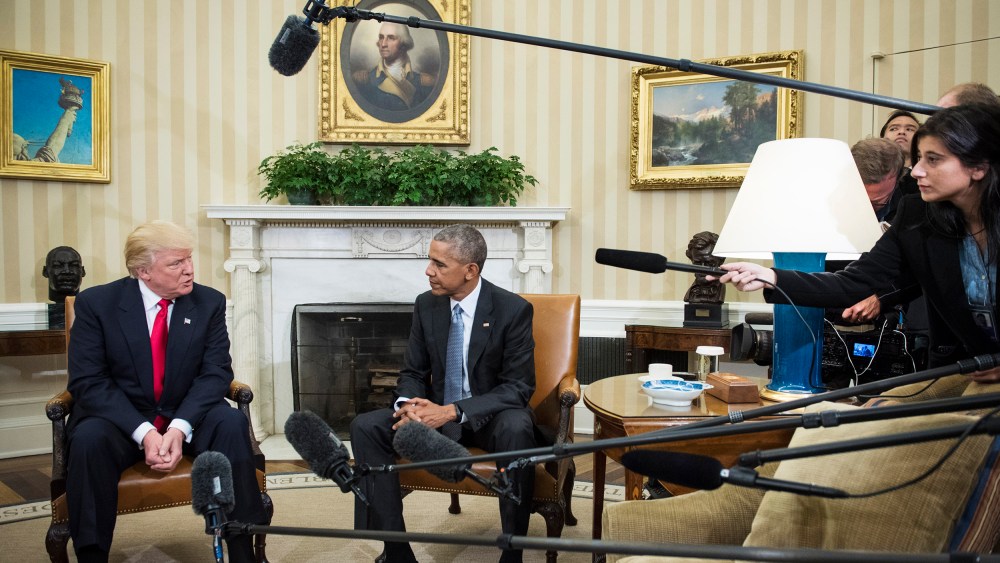 President Barack Obama talks with President-elect Donald Trump in the Oval Office