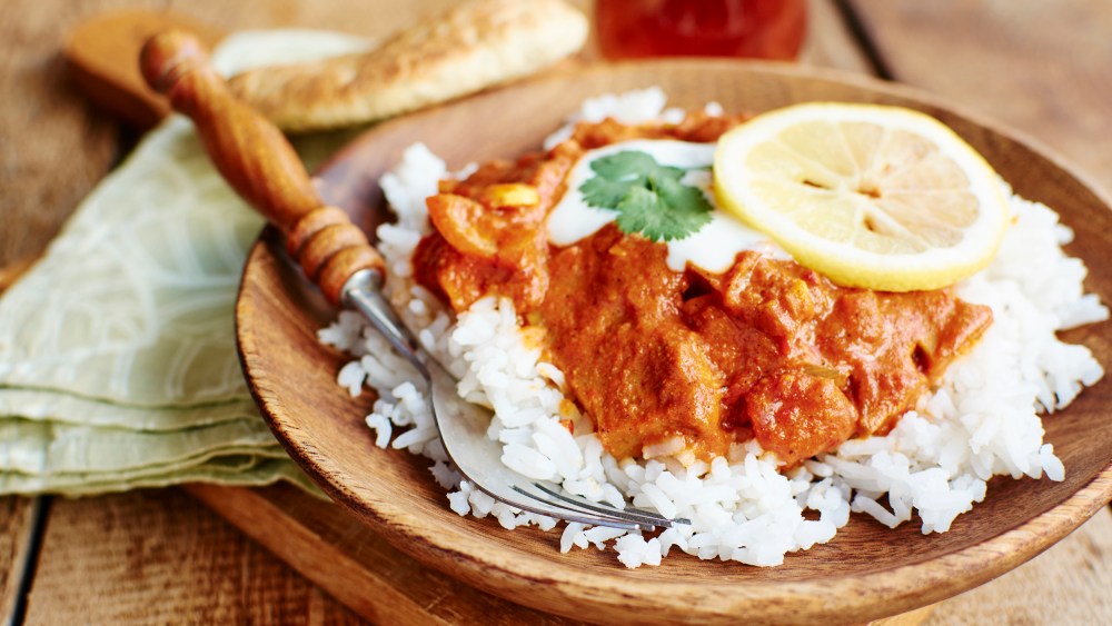Image: Seitan Tikka Masala on rice with soy yogurt and served with paratha bread