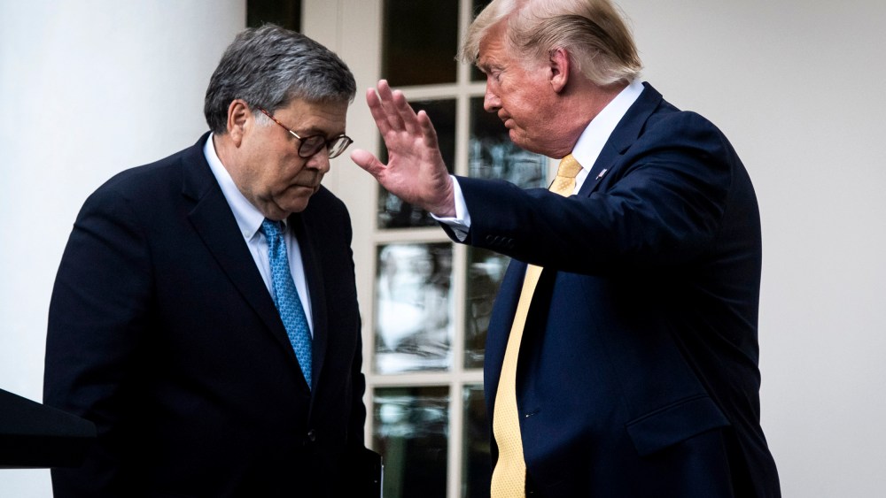 Image: President Donald Trump and Attorney General William Barr leave the Rose Garden on July 11, 2019.