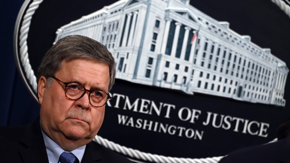 Image: Attorney General William Barr holds a press conference rat the Department of Justice in Washington
