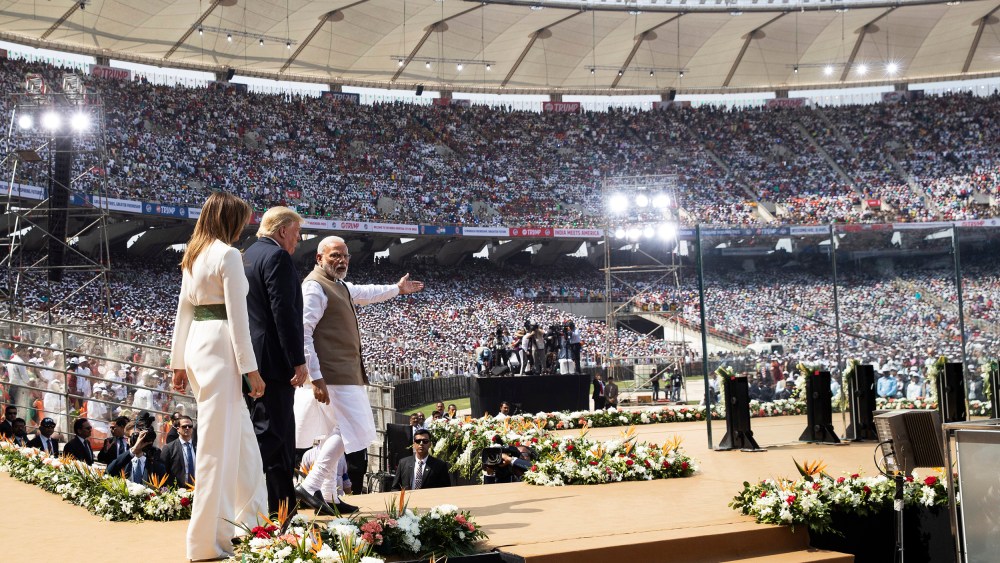 Image: President Donald Trump, first lady Melania Trump, and Indian Prime Minister Narendra Modi arrive for a "Namaste Trump," event at Sardar Patel Stadium,