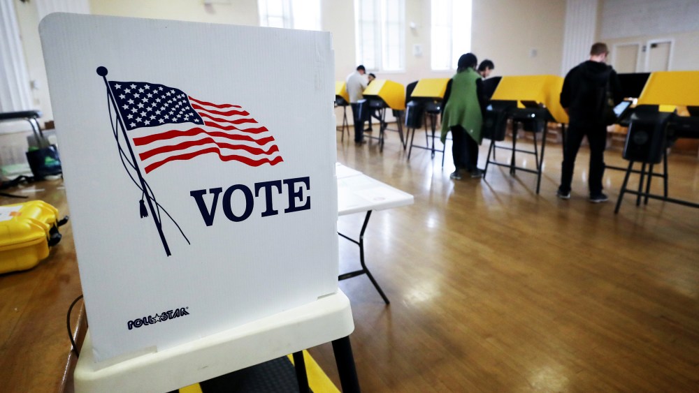 Image: Voters cast ballots during early voting for the presidential primary in Los Angeles, Calif., on March 1, 2020.