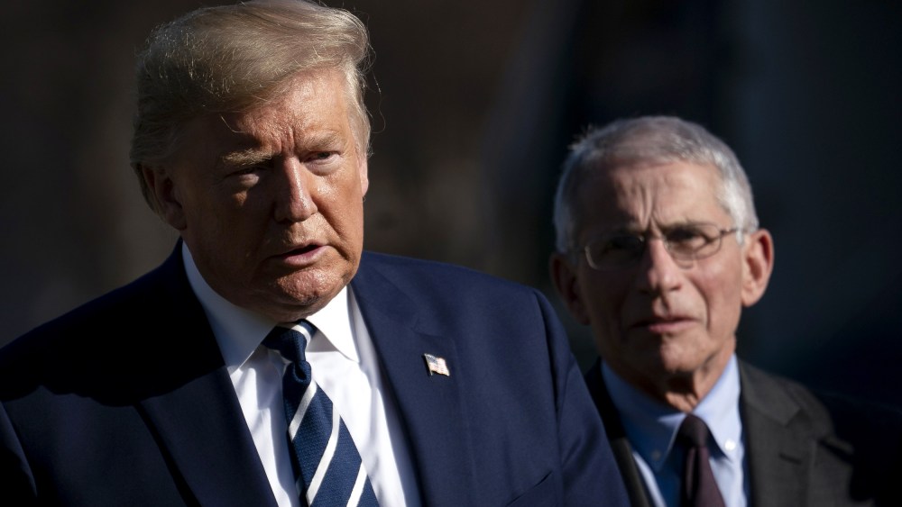 Image: President Donald Trump and Dr. Anthony Fauci, director of the NIH National Institute of Allergy and Infectious Diseases, walk on the South Lawn on March 3, 2020.