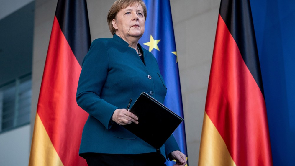 Image: German Chancellor Angela Merkel arrives for a media statement on the spread of coronavirus at the Chancellery in Berlin, Germany