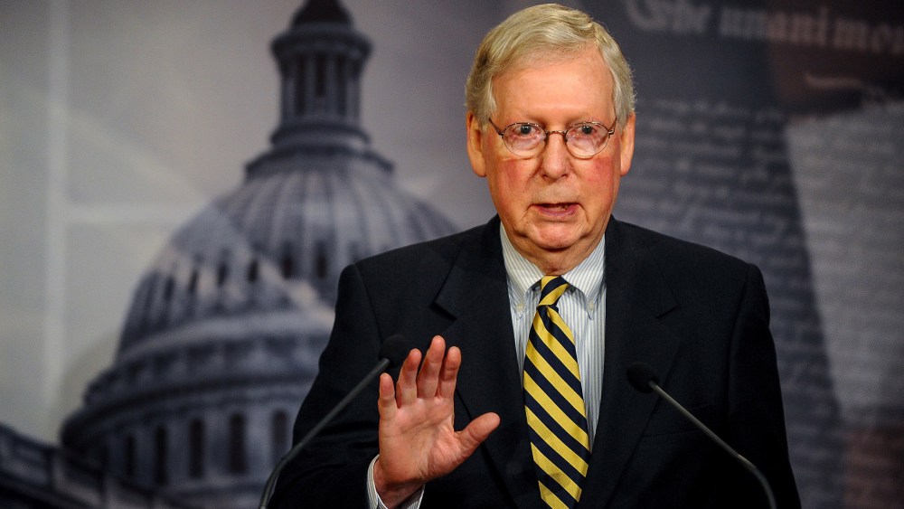 Image: Senate Majority Leader Mitch McConnell (R-KY) speaks to the media after a meeting to wrap up work on coronavirus economic aid legislation, during the coronavirus disease (COVID-19) outbreak, in Washington