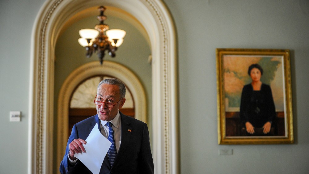 Image: U.S. Senate Minority Leader Chuck Schumer (D-NY) makes a statement after meetings to wrap up work on coronavirus economic aid legislation, during the coronavirus disease (COVID-19) outbreak, in Washington
