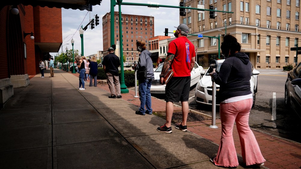 Image: People wait to file for unemployment at the Arkansas Workforce Center in Fort Smith on April 6, 2020.