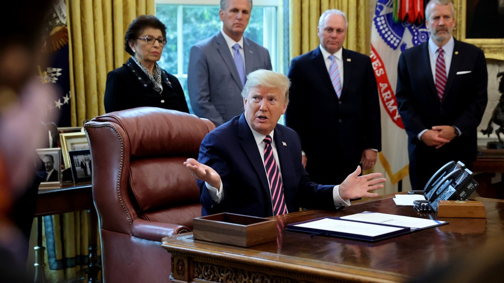 Image: U.S. President Trump participates in coronavirus relief bill signing ceremony at the White House in Washington