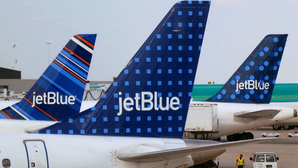 Image: JetBlue Airways aircrafts are pictured at departure gates at John F. Kennedy International Airport in New York.