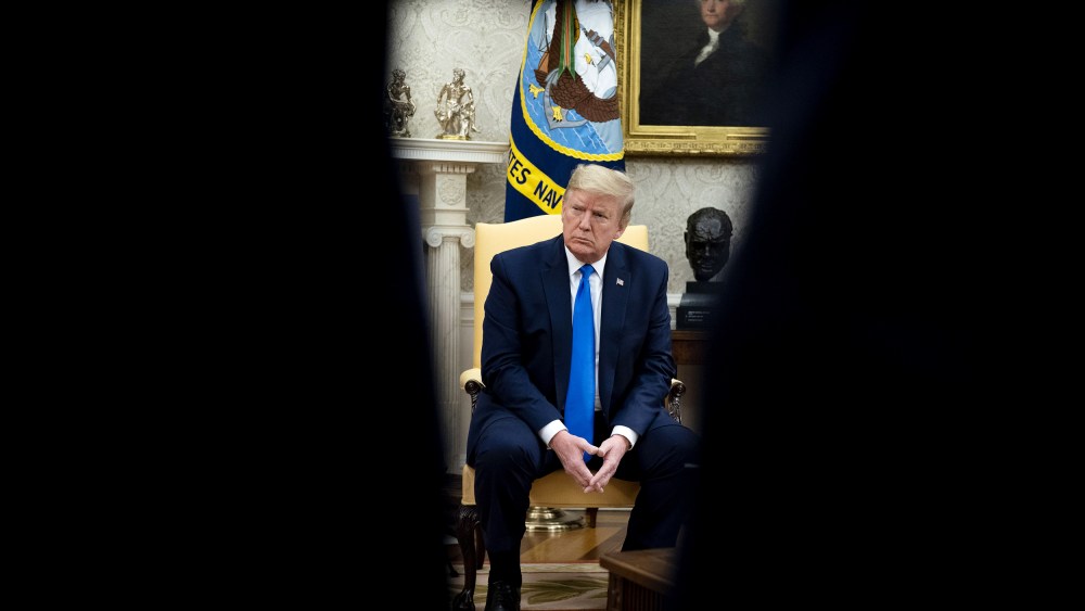 Image: President Donald Trump listens during a meeting with Iowa Governor Kim Reynolds on reopening businesses amid coronavirus at the Oval Office on May 6, 2020.