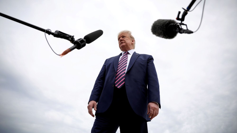 Image: President Donald Trump speaks to reporters as he departs Washington at Joint Base Andrews on May 5, 2020.