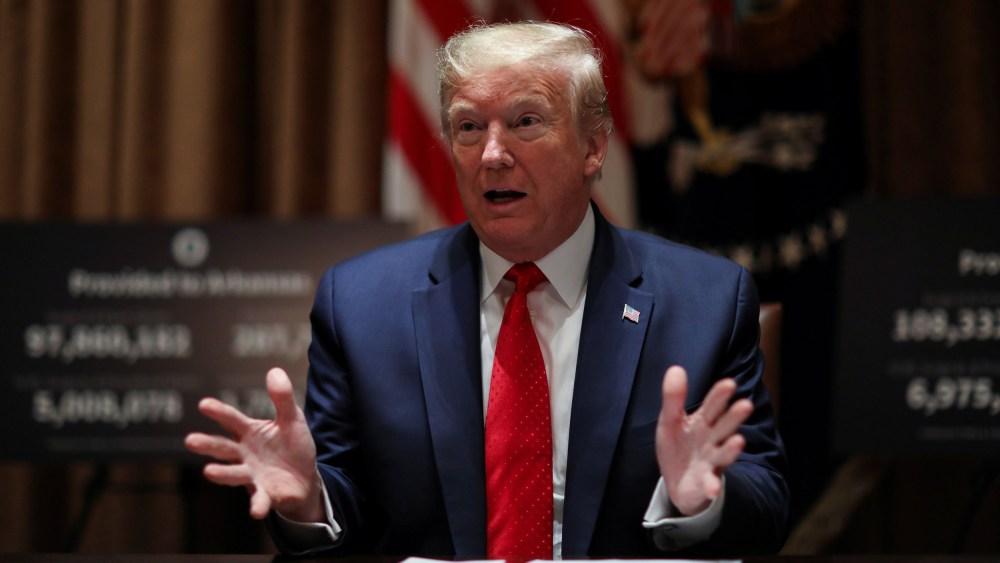 Image: President Donald Trump speaks about the coronavirus disease (COVID-19) pandemic response during a meeting with Kansas Governor Laura Kelly and Arkansas Governor Asa Hutchinson in the Cabinet Room at the White House