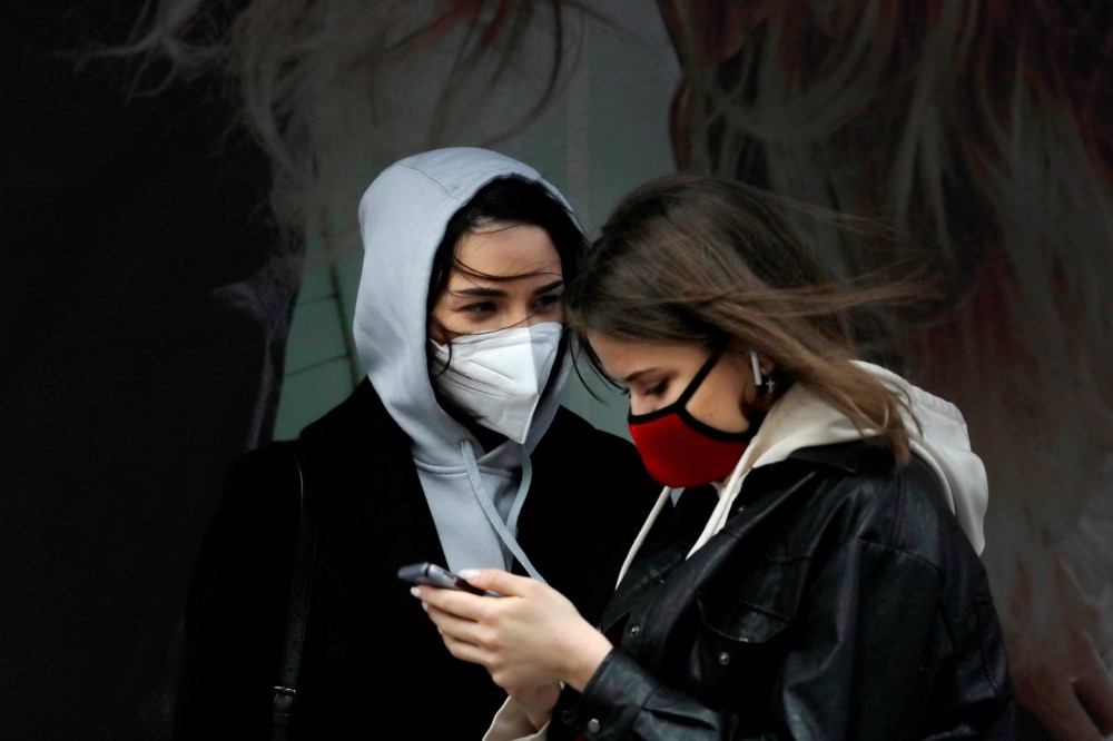 Image: Women wearing masks in New York's Times Square on April 9, 2020.