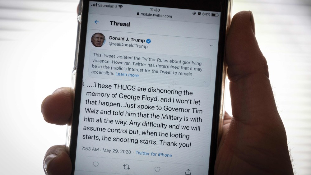Image:The twitter page of President Donald Trump is displayed on a mobile phone