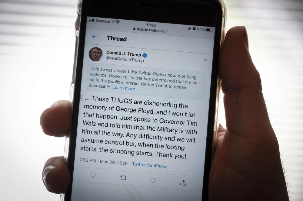 Image:The twitter page of President Donald Trump is displayed on a mobile phone