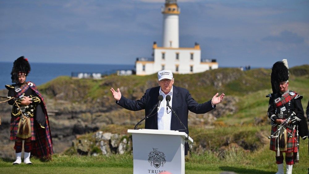Image: Donald Trump gives a press conference on the 9th tee at his Trump Turnberry Resort