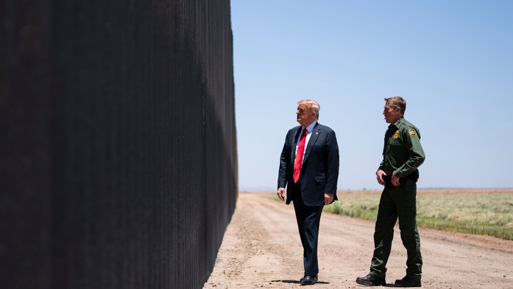 United State Border Patrol chief Rodney Scott gives President Donald Trump a tour of a section of the border wall in San Luis, Ariz., on June 23, 2020.