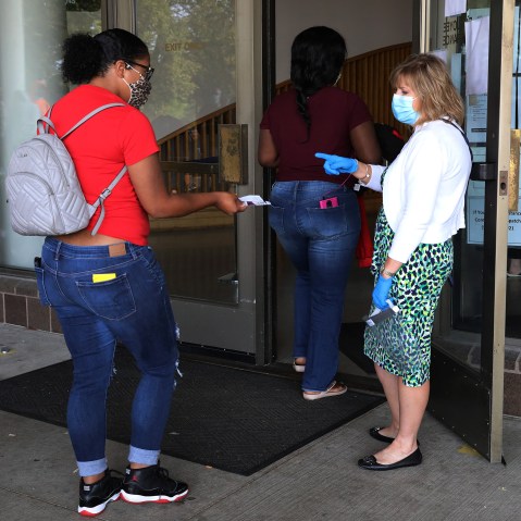 Image: People Wait In Line To File For Unemployment Benefits In Frankfort, Kentucky