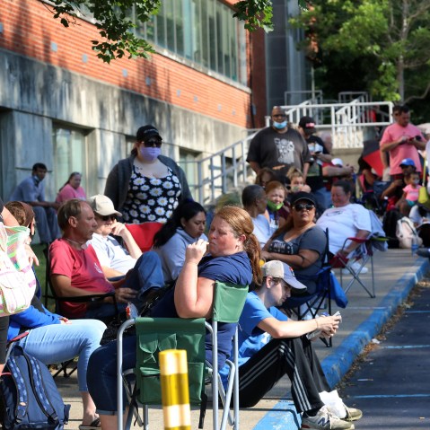 Image: People Wait In Line To File For Unemployment Benefits In Frankfort, Kentucky
