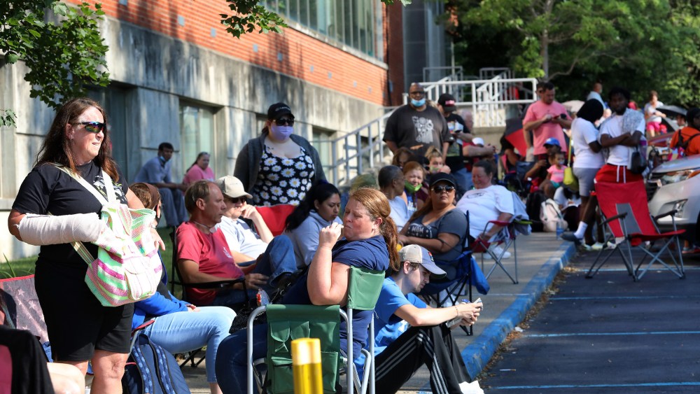 Image: People Wait In Line To File For Unemployment Benefits In Frankfort, Kentucky