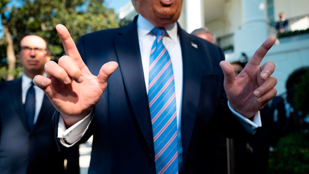 Image: President Donald Trump speaks as he departs the White House.