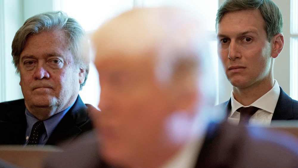 Trump advisers Bannon and Kushner listen as U.S. President Donald Trump meets with members of his Cabinet at the White House in Washington