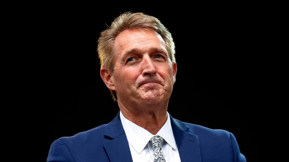 Image: Sen. Jeff Flake, R-Ariz., listens to a question during an appearance at the Forbes 30 Under 30 Summit in Boston.