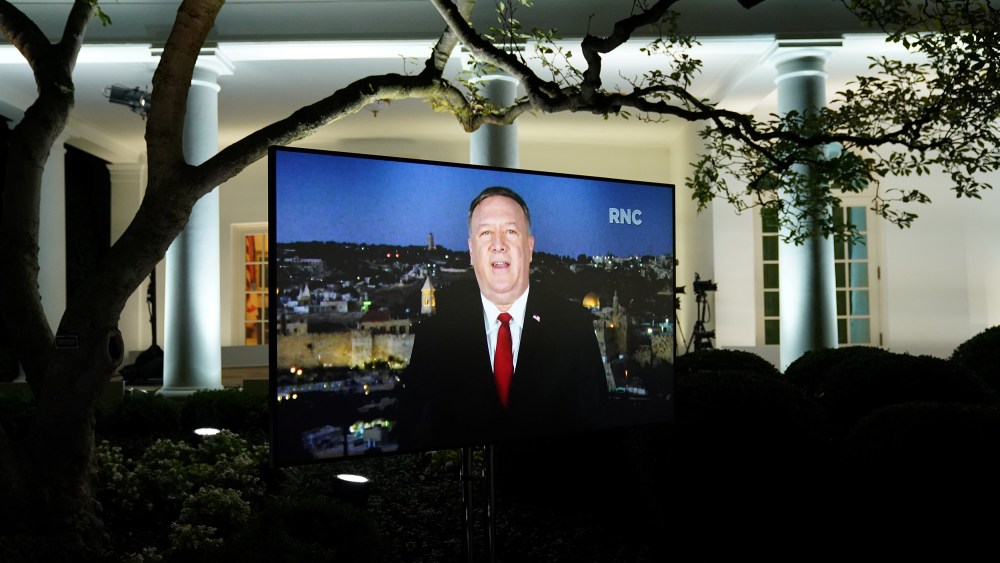 Image: U.S. Secretary of State Mike Pompeo is seen giving his live address to the 2020 Republican National Convention from Israel on a TV at the White House in Washington