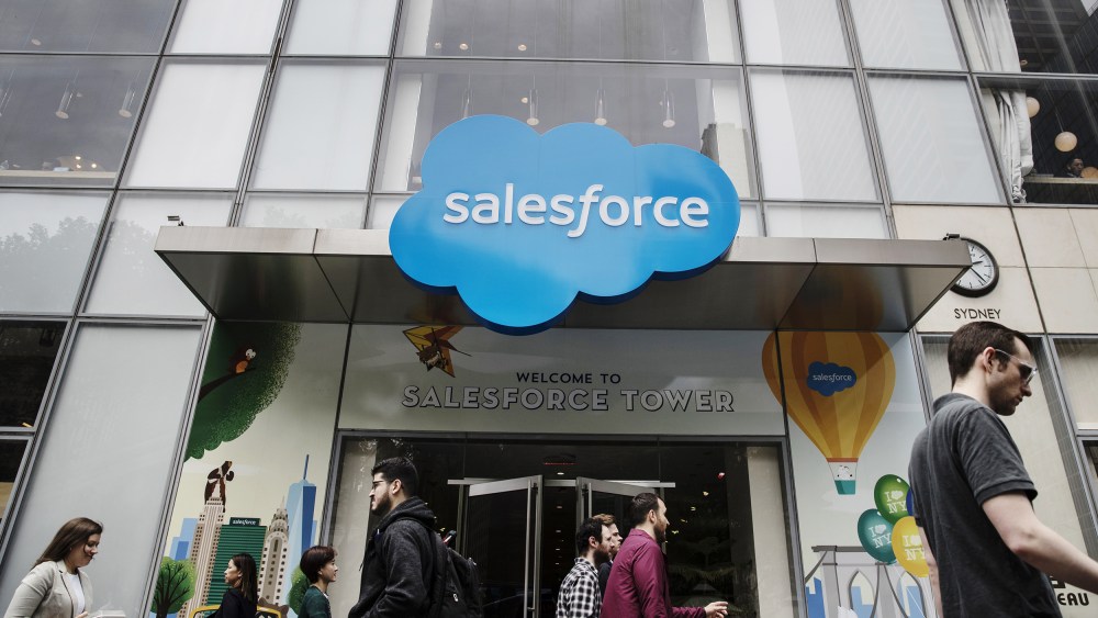 Image: Pedestrians pass in front of the Salesforce Tower in New York on  May 30, 2019.