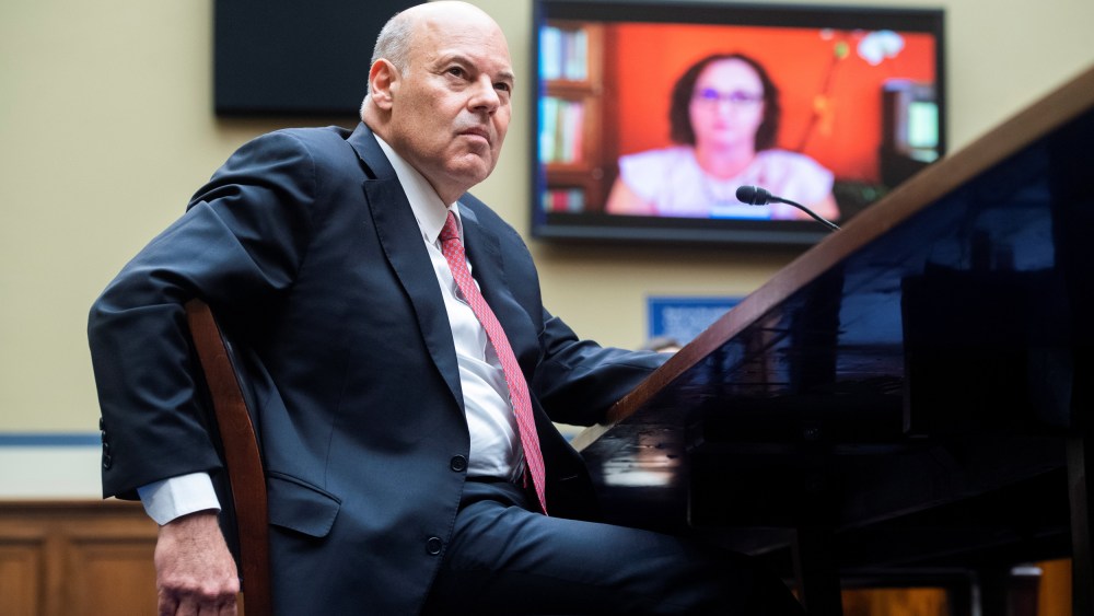 Image: Rep. Katie Porter questions Postmaster General Louis DeJoy during the House Oversight and Reform Committee hearing in Washington