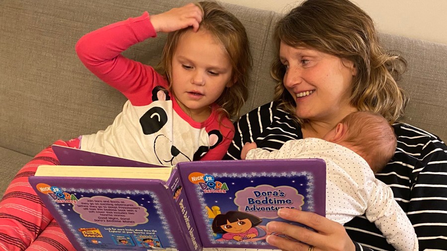 Assemblymember Buffy Wicks, D-Oakland, reads to her daughters, 3-year-old Josephine and 6-week-old Eloise.