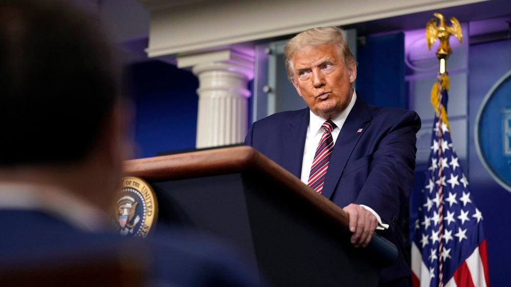 Image: President Donald Trump pauses as he speaks during a news conference at the White House,