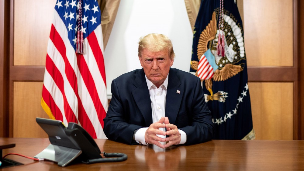 Image:President Donald Trump participates in a phone call with Vice President Mike Pence, Secretary of State Mike Pompeo, and Chairman of the Joint Chiefs of Staff Gen. Mark Milley in his conference room at Walter Reed National Military Medical Center